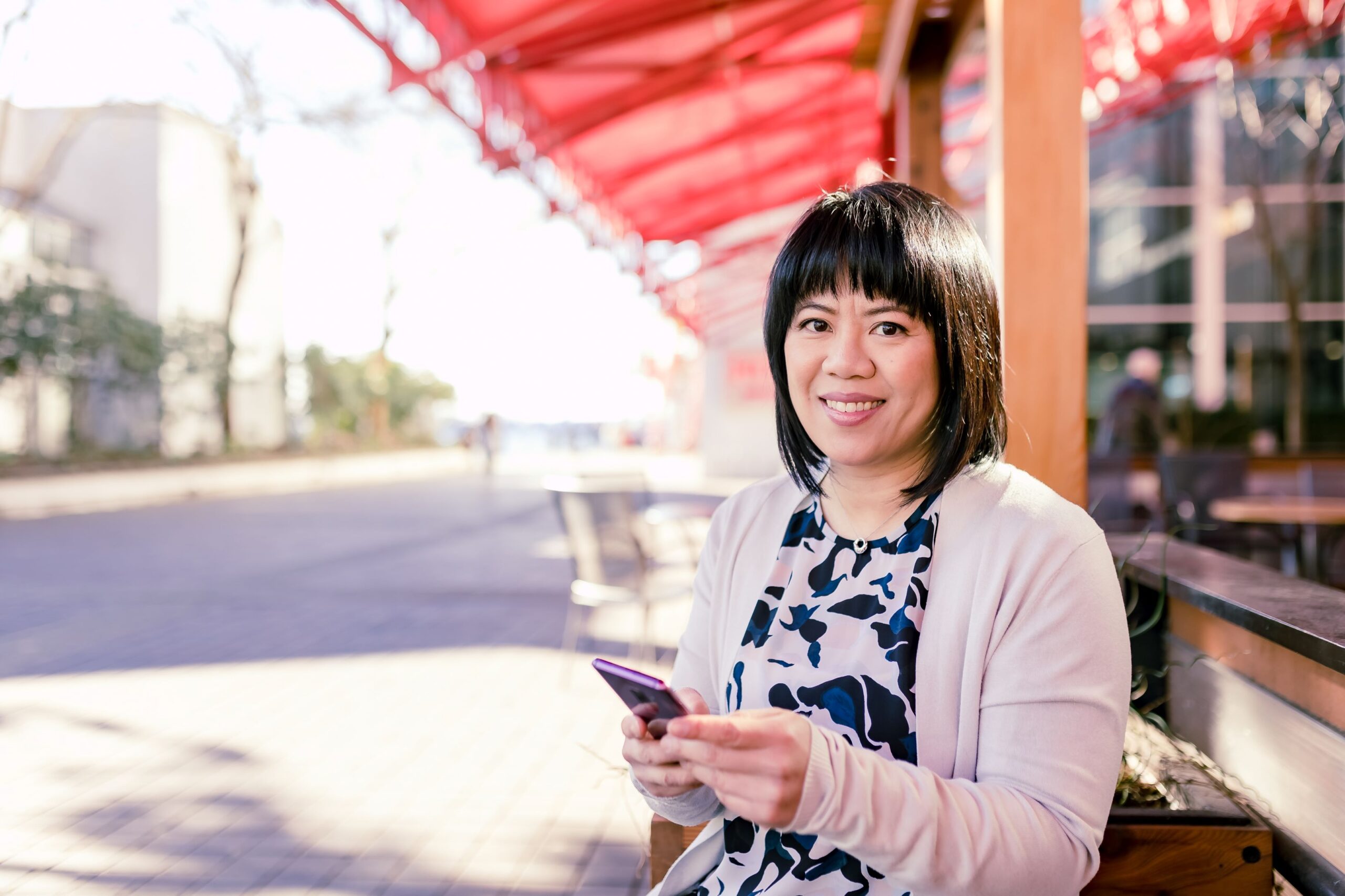 Michelle Chow working on phone